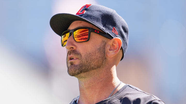 Apr 6, 2024; Minneapolis, Minnesota, USA; Cleveland Guardians bench coach Craig Albernaz (55) walks to the dugout after meeting with the umpires before the game against the Minnesota Twins at Target Field.