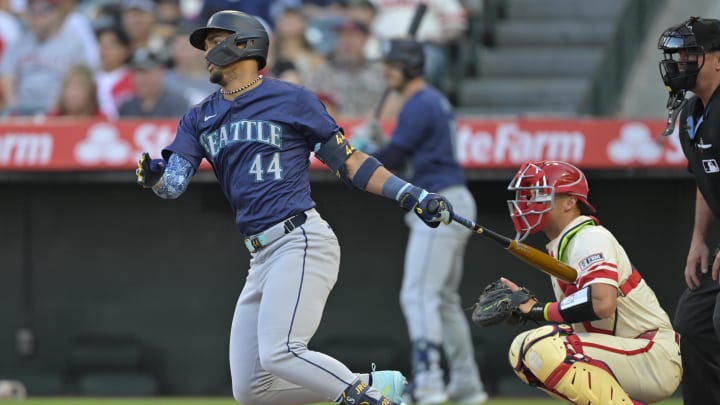 Seattle Mariners center fielder Julio Rodriguez hits an RBI single against the Los Angeles Angels on Saturday at Angel Stadium.