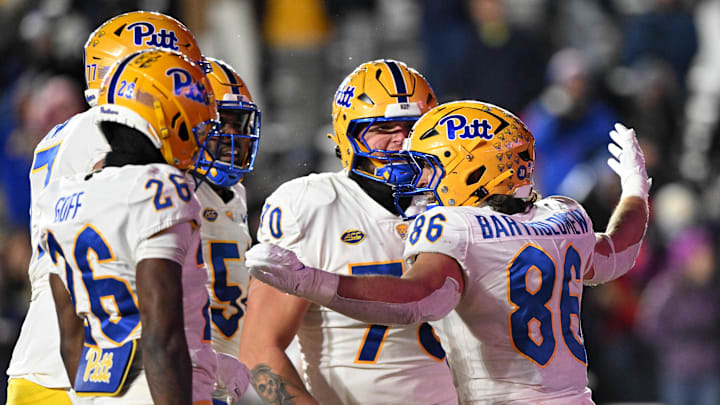Nov 30, 2024; Chestnut Hill, Massachusetts, USA; Pittsburgh Panthers tight end Gavin Bartholomew (86) celebrates with his teammates after scoring a touchdown against the Boston College Eagles during the second half at Alumni Stadium. Mandatory Credit: Brian Fluharty-Imagn Images
