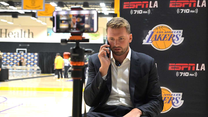 Aug 2, 2025; El Segundo, CA, USA; Los Angeles Lakers Luka Doncic (77) is interviewed by ESPN LA radio following a press conference announcing the signing of a 3-year, $165 million contract extension at UCLA Health Training Center. Mandatory Credit: Jayne Kamin-Oncea-Imagn Images Aug 2, 2025; El Segundo, CA, USA; Los Angeles Lakers Luka Doncic (77) is interviewed by ESPN LA radio following a press conference announcing the signing of a 3-year, $165 million contract extension at UCLA Health Training Center. Mandatory Credit: Jayne Kamin-Oncea-Imagn Images