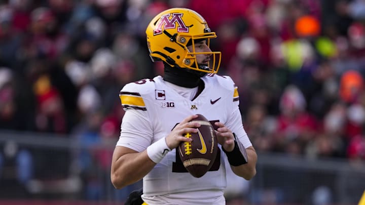 Nov 29, 2024; Madison, Wisconsin, USA;  Minnesota Golden Gophers quarterback Max Brosmer (16) during the game against the Wisconsin Badgers at Camp Randall Stadium. Mandatory Credit: Jeff Hanisch-Imagn Images