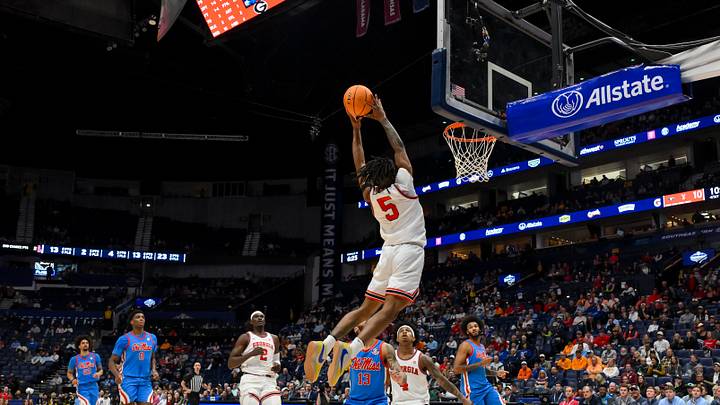 Mar 12, 2026; Nashville, TN, USA; Georgia Bulldogs guard Jeremiah Wilkinson (5) dunks the ball against the Mississippi Rebels during the first half at Bridgestone Arena. Mandatory Credit: Steve Roberts-Imagn Images Mar 12, 2026; Nashville, TN, USA; Georgia Bulldogs guard Jeremiah Wilkinson (5) dunks the ball against the Mississippi Rebels during the first half at Bridgestone Arena. Mandatory Credit: Steve Roberts-Imagn Images