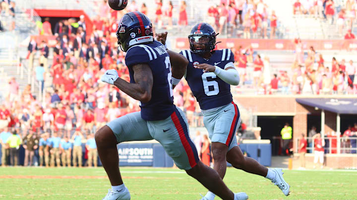 Mississippi Rebels quarterback Trinidad Chambliss (6) passes the ball to wide receiver Harrison Wallace III (2) during the fourth quarter against the Tulane Green Wave at Vaught-Hemingway Stadium. Credit: Petre Thomas-Imagn Images Mississippi Rebels quarterback Trinidad Chambliss (6) passes the ball to wide receiver Harrison Wallace III (2) during the fourth quarter against the Tulane Green Wave at Vaught-Hemingway Stadium. Credit: Petre Thomas-Imagn Images