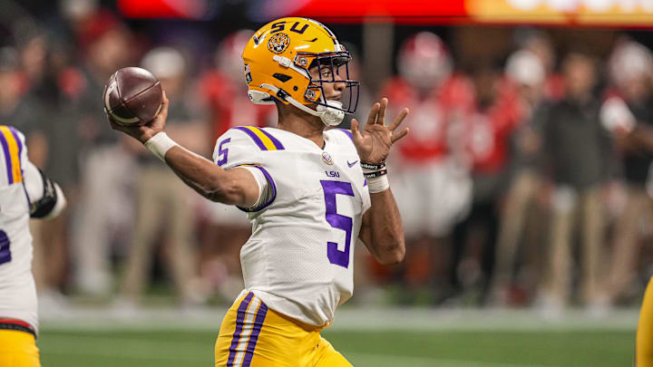 Dec 3, 2022; Atlanta, GA, USA; LSU Tigers quarterback Jayden Daniels (5) passes the ball against the
