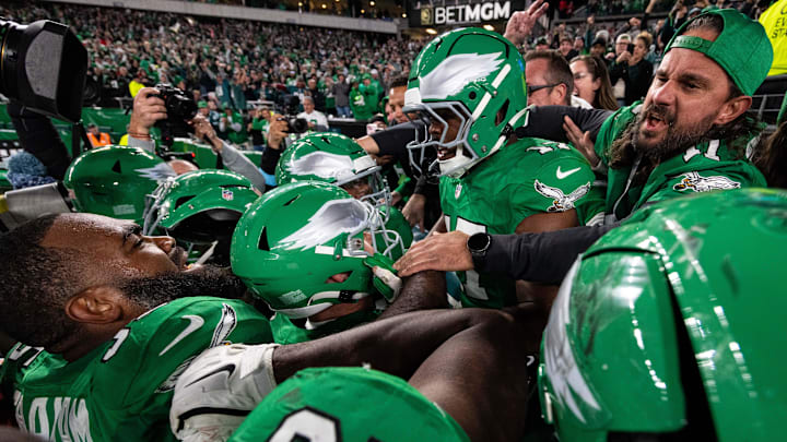 Nov 3, 2024; Philadelphia, Pennsylvania, USA; Philadelphia Eagles linebacker Nakobe Dean (17) celebrates with teammates and fans after an interception late in the fourth quarter against the Jacksonville Jaguars at Lincoln Financial Field. 