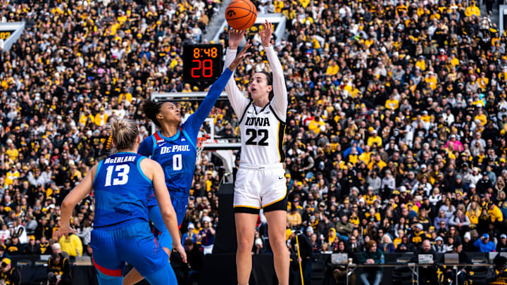 Iowa guard Caitlin Clark (22) attempts a basket during Crossover at Kinnick at Kinnick Stadium on Sunday, October 15, 2023 in Iowa City. Iowa guard Caitlin Clark (22) attempts a basket during Crossover at Kinnick at Kinnick Stadium on Sunday, October 15, 2023 in Iowa City.