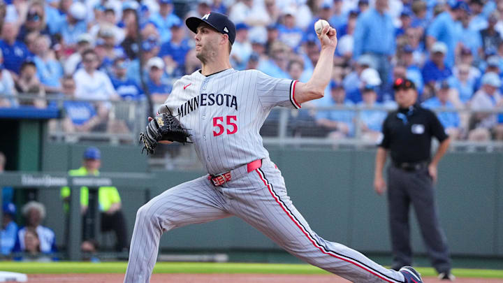 Mar 30, 2026; Kansas City, Missouri, USA; Minnesota Twins pitcher Taylor Rogers (55) delivers a pitch against the Kansas City Royals during the game at Kauffman Stadium. Mandatory Credit: Denny Medley-Imagn Images