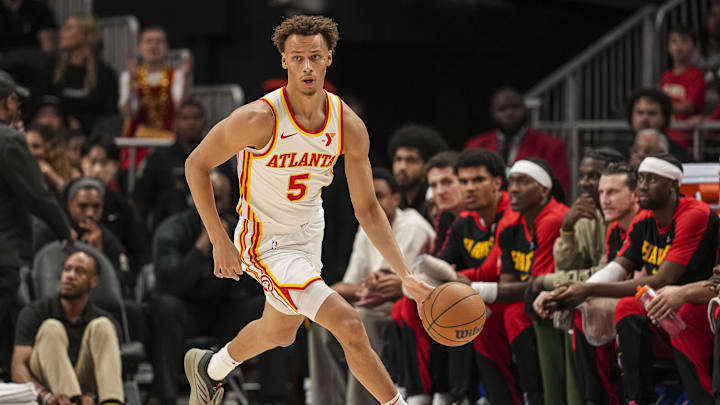 Apr 1, 2025; Atlanta, Georgia, USA; Atlanta Hawks guard Dyson Daniels (5) dribbles up the floor against the Portland Trail Blazers during the first half at State Farm Arena. Mandatory Credit: Dale Zanine-Imagn Images