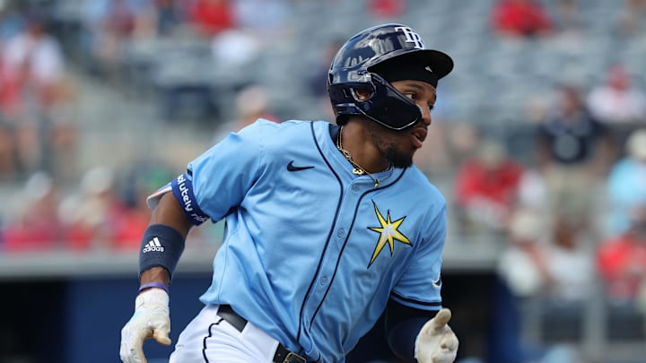 Tampa Bay Rays outfielder Chandler Simpson (96) singles against the Philadelphia Phillies during the third inning at Charlotte Sports Park on Feb 25.