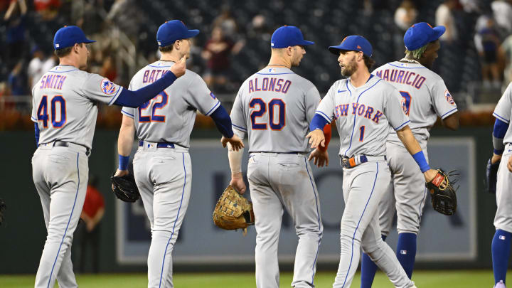 Sep 5, 2023; Washington, District of Columbia, USA; New York Mets right fielder Jeff McNeil (1) and first baseman Pete Alonso (20) celebrate after the game against the Washington Nationals at Nationals Park. Mandatory Credit: Brad Mills-USA TODAY Sports