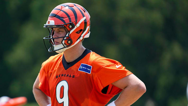 Cincinnati Bengals quarterback Joe Burrow (9) looks on between plays during a session of organized team activities on the Bengals practice field at Paycor Stadium in downtown Cincinnati on Tuesday, June 3, 2025. Cincinnati Bengals quarterback Joe Burrow (9) looks on between plays during a session of organized team activities on the Bengals practice field at Paycor Stadium in downtown Cincinnati on Tuesday, June 3, 2025.