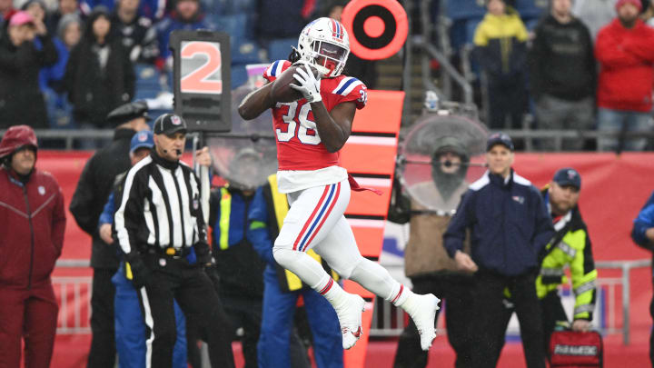 Dec 3, 2023; Foxborough, Massachusetts, USA; New England Patriots running back Rhamondre Stevenson (38) makes a catch against the Los Angeles Chargers during the first half at Gillette Stadium. Mandatory Credit: Brian Fluharty-USA TODAY Sports