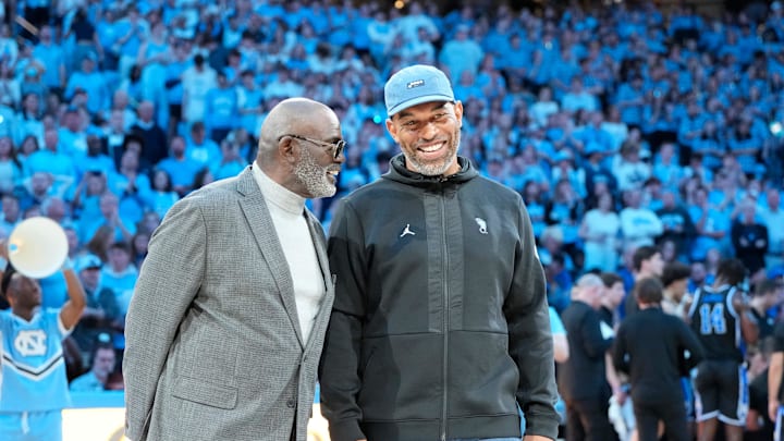 Former North Carolina Tar Heels football greats Lawrence Taylor and Julius Peppers . Former North Carolina Tar Heels football greats Lawrence Taylor and Julius Peppers .