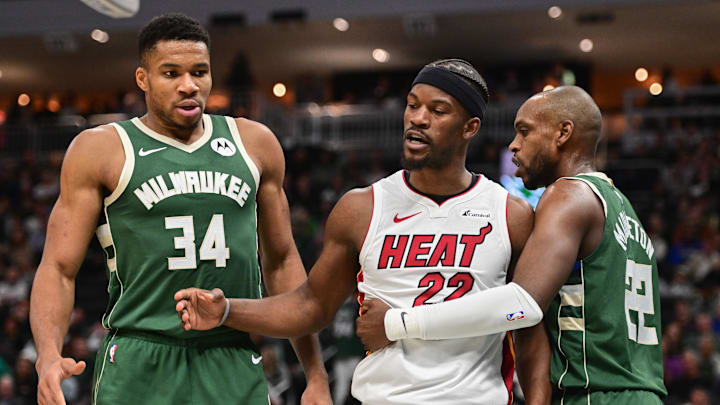 Miami Heat center Jimmy Butler and Milwaukee Bucks forward Giannis Antetokounmpo face off tonight. Who will cover the spread?