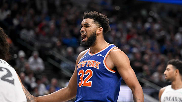 Nov 27, 2024; Dallas, Texas, USA; New York Knicks center Karl-Anthony Towns (32) yells out after being fouled during the second half against the Dallas Mavericks at the American Airlines Center. Mandatory Credit: Jerome Miron-Imagn Images