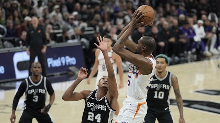 Feb 20, 2025; Austin, Texas, USA; Phoenix Suns forward Kevin Durant (35) shoots over San Antonio Spurs guard Devin Vassell (24) during the first half at Moody Center. Mandatory Credit: Scott Wachter-Imagn Images Feb 20, 2025; Austin, Texas, USA; Phoenix Suns forward Kevin Durant (35) shoots over San Antonio Spurs guard Devin Vassell (24) during the first half at Moody Center. Mandatory Credit: Scott Wachter-Imagn Images