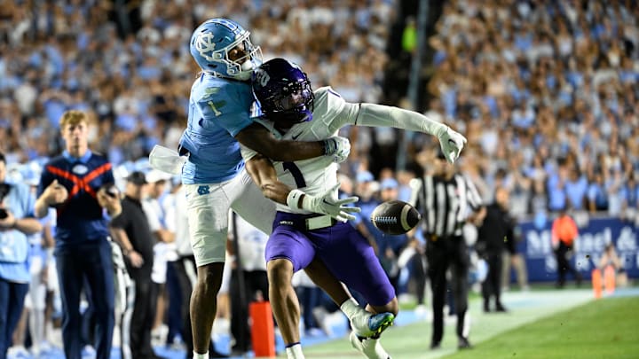 Sep 1, 2025; Chapel Hill, North Carolina, USA; TCU Horned Frogs safety Austin Jordan (1) breaks up a pass intended for North Carolina Tar Heels wide receiver Jordan Shipp (1) in the second quarter at Kenan Stadium. Mandatory Credit: Bob Donnan-Imagn Images