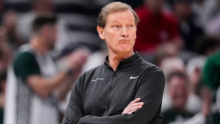 Are you not entertained? Dana Altman strikes his Grinch pose after the Ducks clank another three in the Big Ten tournament loss to Tom Izzo and Michigan State. Oregon shot 21% from distance in the 74-64 loss.