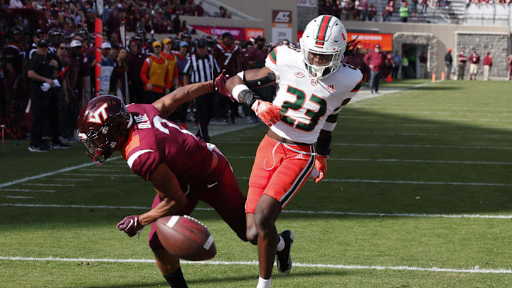 Oct 15, 2022; Blacksburg, Virginia, USA;  Virginia Tech Hokies wide receiver Jadan Blue (2) misses the catch after he was is defended by Miami Hurricanes cornerback Te'Cory Couch (23) during the second half at Lane Stadium. Mandatory Credit: Reinhold Matay-USA TODAY Sports