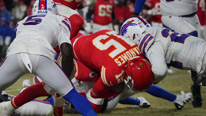 Jan 26, 2025; Kansas City, MO, USA; Kansas City Chiefs quarterback Patrick Mahomes (15) dives for a touchdown against Buffalo Bills cornerback Kaiir Elam (5) during the second half in the AFC Championship game at GEHA Field at Arrowhead Stadium. Mandatory Credit: Denny Medley-Imagn Images