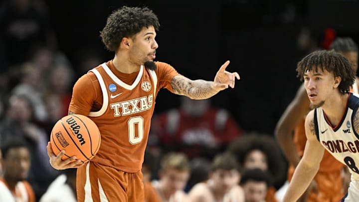Mar 21, 2026; Portland, OR, USA; Texas Longhorns guard Jordan Pope (0) signals against Gonzaga Bulldogs guard Jalen Warley (8) in the second half during a second round game of the men's 2026 NCAA Tournament at Moda Center. Mandatory Credit: Craig Strobeck-Imagn Images Mar 21, 2026; Portland, OR, USA; Texas Longhorns guard Jordan Pope (0) signals against Gonzaga Bulldogs guard Jalen Warley (8) in the second half during a second round game of the men's 2026 NCAA Tournament at Moda Center. Mandatory Credit: Craig Strobeck-Imagn Images