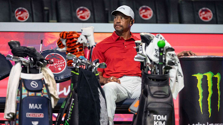 Tiger Woods of Jupiter Links GC sits during a break in their TGL golf match against Atlanta Drive GC at SoFi Center on March 4, 2025, in Palm Beach Gardens, Florida.