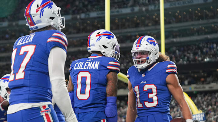 Oct 14, 2024; East Rutherford, New Jersey, USA; Buffalo Bills wide receiver Mack Hollins (13) celebrates after catching a touchdown pass during the first half against the New York Jets at MetLife Stadium.