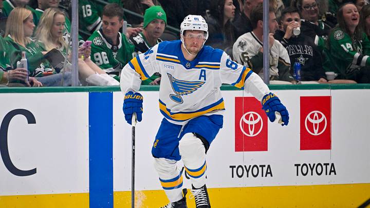 Oct 2, 2026; Dallas, Texas, USA; St. Louis Blues left wing Dylan Holloway (81) skates against the Dallas Stars during the game at the American Airlines Center. Mandatory Credit: Jerome Miron-Imagn Images