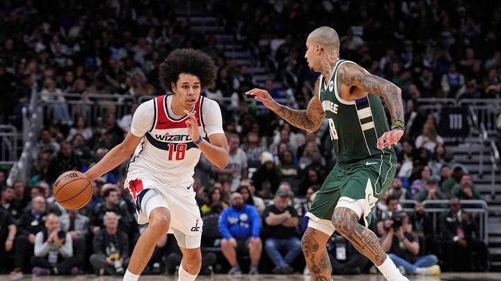 Oct 22, 2025; Milwaukee, Wisconsin, USA; Washington Wizards forward Kyshawn George (18) brings the ball up the court against Milwaukee Bucks forward Kyle Kuzma (18) in the second half at Fiserv Forum. Mandatory Credit: Michael McLoone-Imagn Images Oct 22, 2025; Milwaukee, Wisconsin, USA; Washington Wizards forward Kyshawn George (18) brings the ball up the court against Milwaukee Bucks forward Kyle Kuzma (18) in the second half at Fiserv Forum. Mandatory Credit: Michael McLoone-Imagn Images