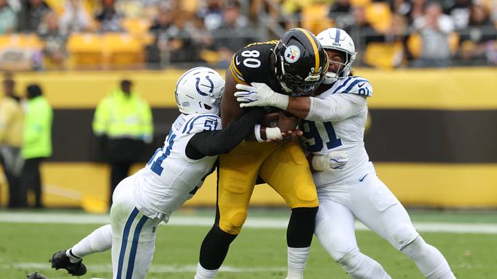 Oct 11, 2026; Pittsburgh, Pennsylvania, USA; Pittsburgh Steelers tight end Darnell Washington (80) is tackled by Indianapolis Colts linebacker Akeem Davis-Gaither (51) and defensive end Jaylahn Tuimoloau (91) in the first half at Acrisure Stadium. Mandatory Credit: Charles LeClaire-Imagn Images Oct 11, 2026; Pittsburgh, Pennsylvania, USA; Pittsburgh Steelers tight end Darnell Washington (80) is tackled by Indianapolis Colts linebacker Akeem Davis-Gaither (51) and defensive end Jaylahn Tuimoloau (91) in the first half at Acrisure Stadium. Mandatory Credit: Charles LeClaire-Imagn Images