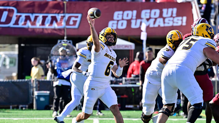 Oct 12, 2024; Amherst, Massachusetts, USA; Missouri Tigers quarterback Drew Pyne (6)   throws a pass against the Massachusetts Minutemen during the second half at Warren McGuirk Alumni Stadium. Mandatory Credit: Eric Canha-Imagn Images