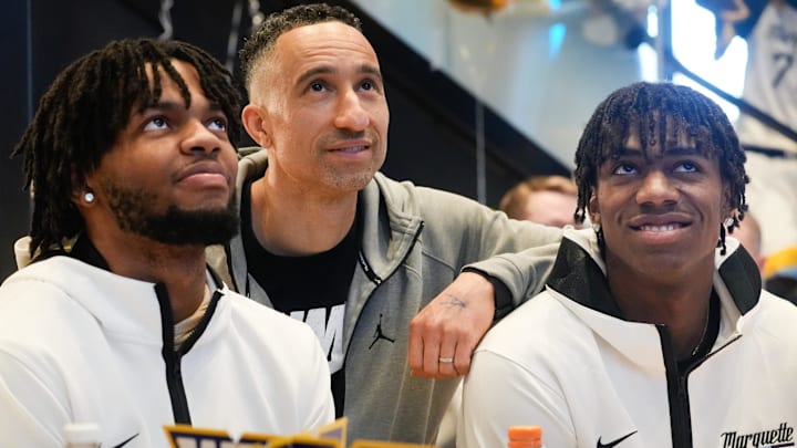 March 17, 2024: Marquette Golden Eagles head coach Shaka Smart shares a moment with his players, junior forward David Joplin and freshman guard Zaide Lowery.