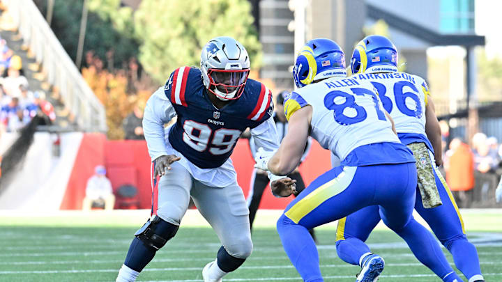 Nov 17, 2024; Foxborough, Massachusetts, USA; New England Patriots defensive end Keion White (99) blocking Los Angeles Rams tight end Davis Allen (87) during the first half at Gillette Stadium. Mandatory Credit: Eric Canha-Imagn Images