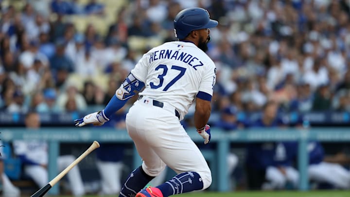 Los Angeles Dodgers outfielder Teoscar Hernandez (37) hits a single against the Chicago Cubs during the first inning at Dodger Stadium on April 12. Los Angeles Dodgers outfielder Teoscar Hernandez (37) hits a single against the Chicago Cubs during the first inning at Dodger Stadium on April 12.