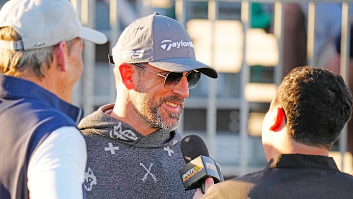 Aaron Rodgers talks with the press at TPC Scottsdale.