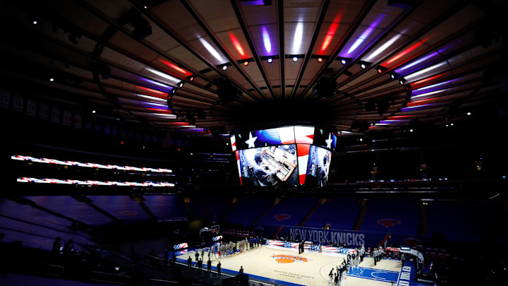 Dec 27, 2020; New York, New York, USA; New York Knicks and the Milwaukee Bucks stand during the National Anthem at Madison Square Garden on December 27, 2020 in New York City. Mandatory Credit:  Mike Stobe/pool photo via Imagn Images