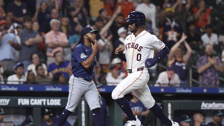 May 13, 2026; Houston, Texas, USA; Houston Astros center fielder Brice Matthews (0) runs past Seattle Mariners pitcher Eduard Bazardo (83) to score a run during the eighth inning at Daikin Park. Mandatory Credit: Troy Taormina-Imagn Images May 13, 2026; Houston, Texas, USA; Houston Astros center fielder Brice Matthews (0) runs past Seattle Mariners pitcher Eduard Bazardo (83) to score a run during the eighth inning at Daikin Park. Mandatory Credit: Troy Taormina-Imagn Images
