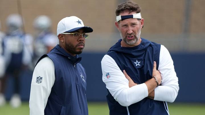 Dallas Cowboys defensive coordinator Christian Parker with head coach Brian Schottenheimer at training camp at River Ridge Playing Fields. 