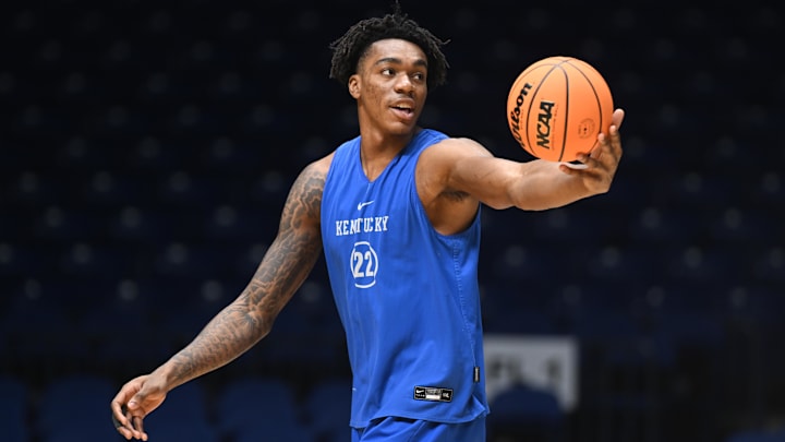 Mar 27, 2025; Indianapolis, IN, USA; Kentucky Wildcats center Amari Williams (22) stretches during the NCAA tournament midwest regional practice day at Lucas Oil Stadium. Mandatory Credit: Robert Goddin-Imagn Images