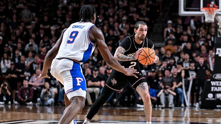 Feb 7, 2026; College Station, Texas, USA; Texas A&M Aggies guard Pop Isaacs (2) looks to pass the ball against the Florida Gators during the second half at Reed Arena. Mandatory Credit: Maria Lysaker-Imagn Images