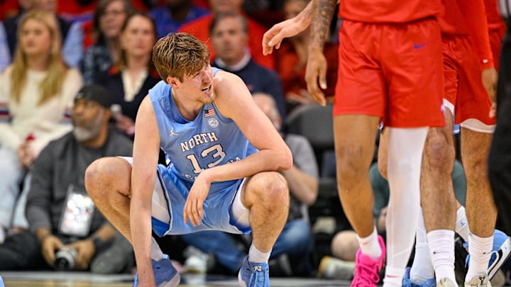 Jan 3, 2026; Dallas, Texas, USA; North Carolina Tar Heels center Henri Veesaar (13) reacts to getting poked in the eye during the first half against the SMU Mustangs at Moody Coliseum. Mandatory Credit: Jerome Miron-Imagn Images