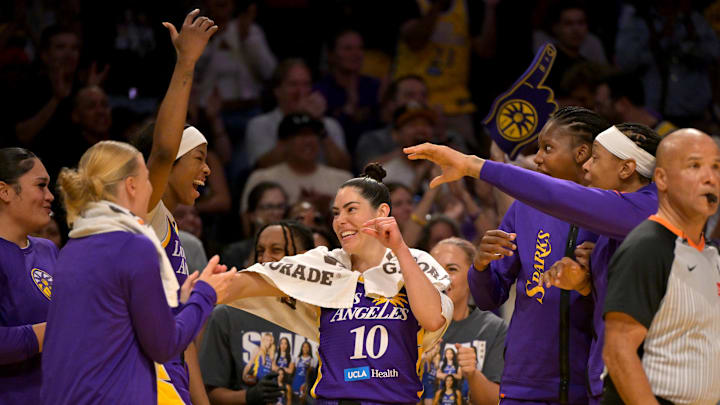 Sep 7, 2025; Los Angeles, California, USA;  Los Angeles Sparks guard Kelsey Plum (10) and the bench react after a basket during the second half against the Dallas Wings at Crypto.com Arena. Mandatory Credit: Jayne Kamin-Oncea-Imagn Images