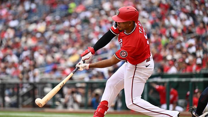 Jul 12, 2026; Washington, District of Columbia, USA;  Washington Nationals infielder Jose Tena (8) hits a double in the fifth inning against the New York Yankees at Nationals Park. Mandatory Credit: Jamie Sabau-Imagn Images