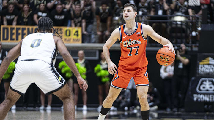 Jan 24, 2026; West Lafayette, Indiana, USA; Illinois Fighting Illini guard Mihailo Petrovic (77) looks for an open teammate during the first half against the Purdue Boilermakers at Mackey Arena. Mandatory Credit: Jacob Musselman-Imagn Images Jan 24, 2026; West Lafayette, Indiana, USA; Illinois Fighting Illini guard Mihailo Petrovic (77) looks for an open teammate during the first half against the Purdue Boilermakers at Mackey Arena. Mandatory Credit: Jacob Musselman-Imagn Images