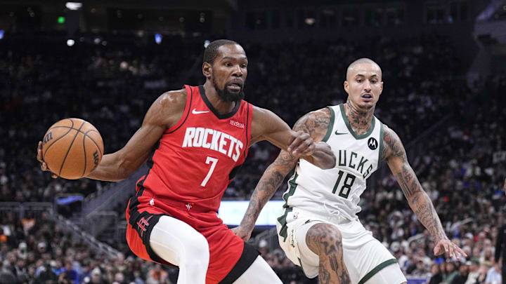 Nov 9, 2025; Milwaukee, Wisconsin, USA; Houston Rockets forward Kevin Durant (7) drives against Milwaukee Bucks forward Kyle Kuzma (18) in the first half at Fiserv Forum. Mandatory Credit: Michael McLoone-Imagn Images
