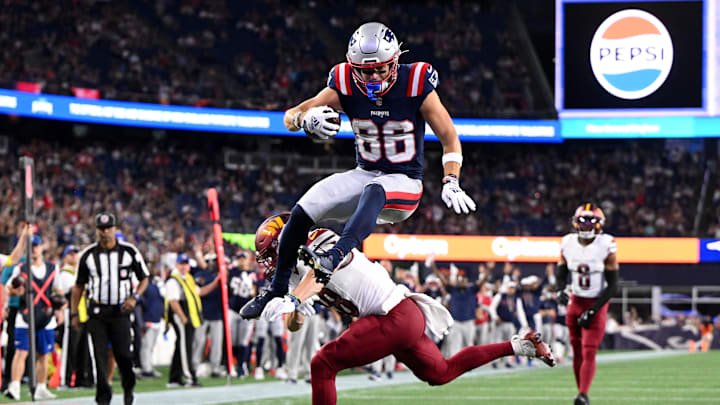 Aug 8, 2025; Foxborough, Massachusetts, USA; New England Patriots wide receiver Efton Chism III (86) scores a touchdown against the Washington Commanders during the second half at Gillette Stadium. Mandatory Credit: Brian Fluharty-Imagn Images