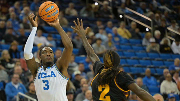 Dec 17, 2025; Los Angeles, California, USA;  UCLA Bruins guard Eric Dailey Jr. (3) is defended by Arizona State Sun Devils guard Anthony Johnson (2) in the first half at Pauley Pavilion presented by Wescom Financial. Mandatory Credit: Jayne Kamin-Oncea-Imagn Images 