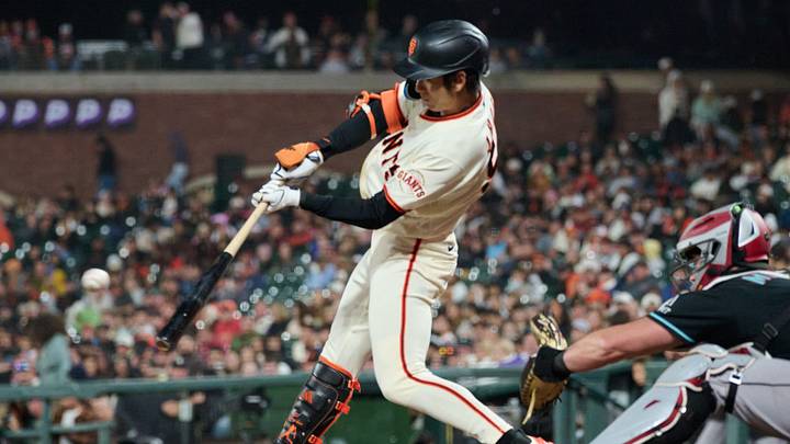 Aug 29, 2026; San Francisco, California, USA; San Francisco Giants outfielder Jung Hoo Lee (51) hits a one run RBI single against Arizona Diamondbacks pitcher Derek Law (38) during the seventh inning at Oracle Park. Mandatory Credit: Robert Edwards-Imagn Images Aug 29, 2026; San Francisco, California, USA; San Francisco Giants outfielder Jung Hoo Lee (51) hits a one run RBI single against Arizona Diamondbacks pitcher Derek Law (38) during the seventh inning at Oracle Park. Mandatory Credit: Robert Edwards-Imagn Images