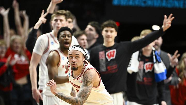Mar 19, 2026; Portland, OR, USA; Wisconsin Badgers guard Braeden Carrington (0) reacts after a shot against the High Point Panthers during the second half of a first round game of the men's 2026 NCAA Tournament at Moda Center. Mandatory Credit: Craig Strobeck-Imagn Images Mar 19, 2026; Portland, OR, USA; Wisconsin Badgers guard Braeden Carrington (0) reacts after a shot against the High Point Panthers during the second half of a first round game of the men's 2026 NCAA Tournament at Moda Center. Mandatory Credit: Craig Strobeck-Imagn Images