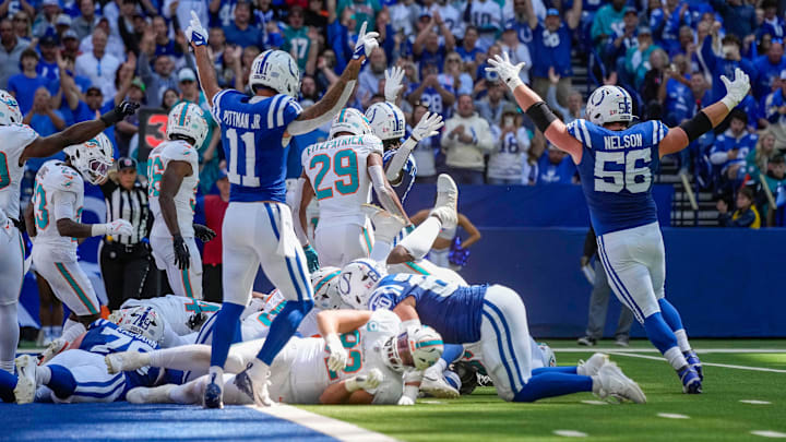 Indianapolis Colts guard Quenton Nelson (56) and Indianapolis Colts wide receiver Michael Pittman Jr. (11) celebrate a touchdown Sunday, Sept. 7, 2025, during the game at Lucas Oil Stadium in Indianapolis. The Indianapolis Colts defeated the Miami Dolphins, 33-8.